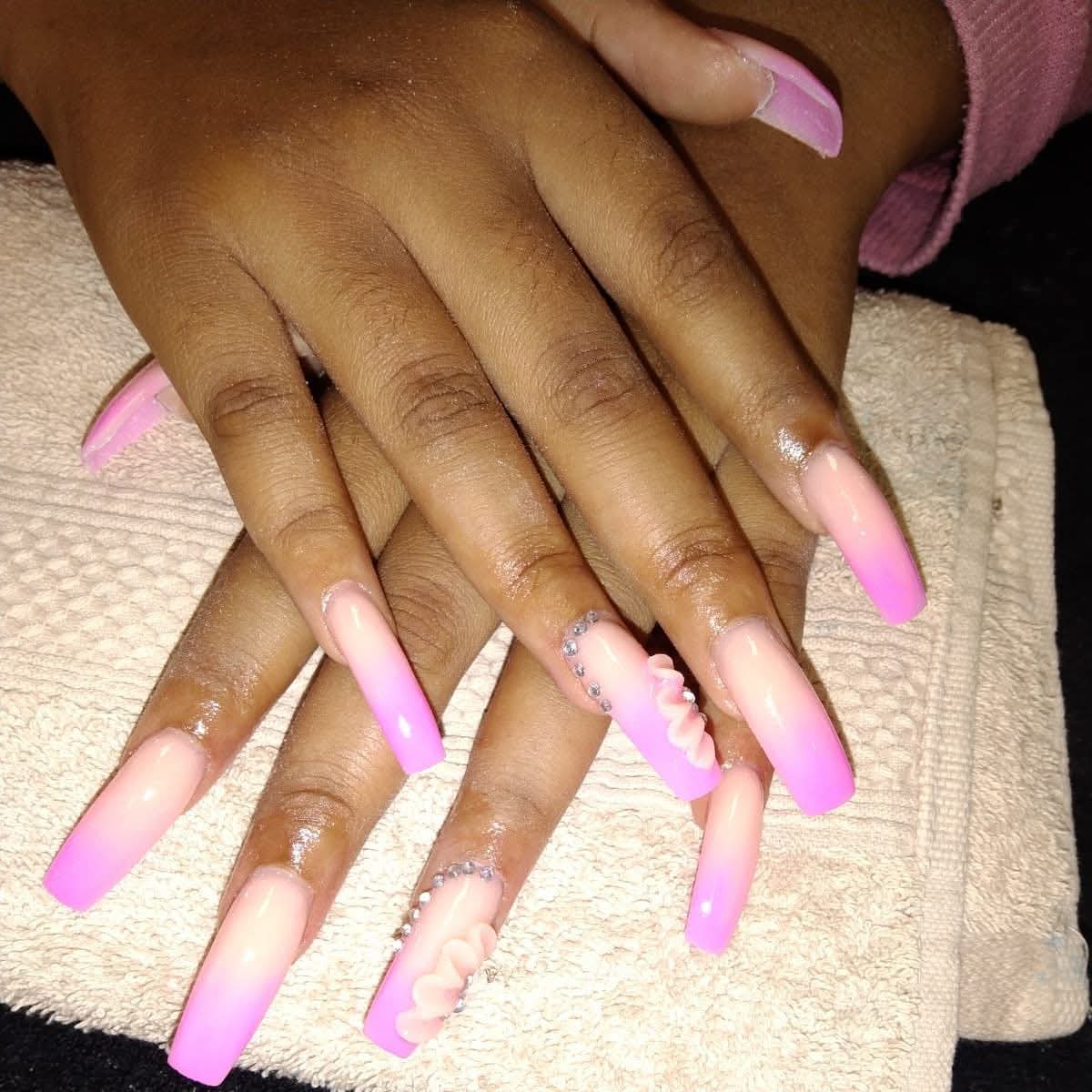Long pink ombré coffin acrylic nails with 3D floral art